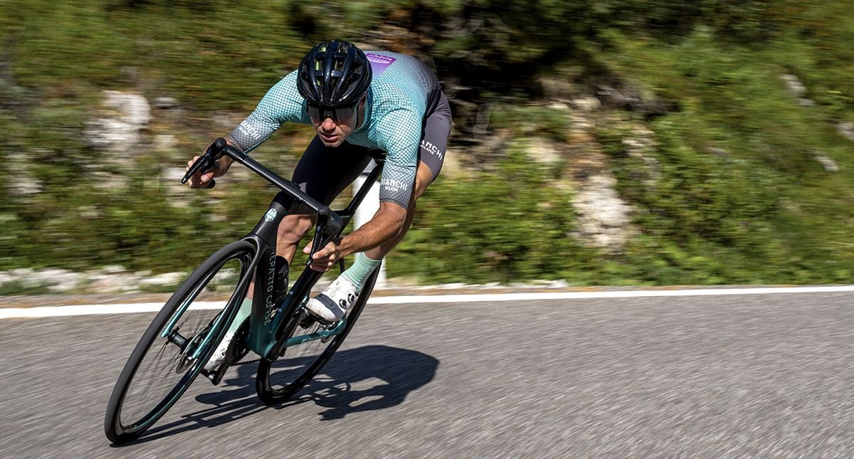 Cyclist riding Bianchi Specialissima