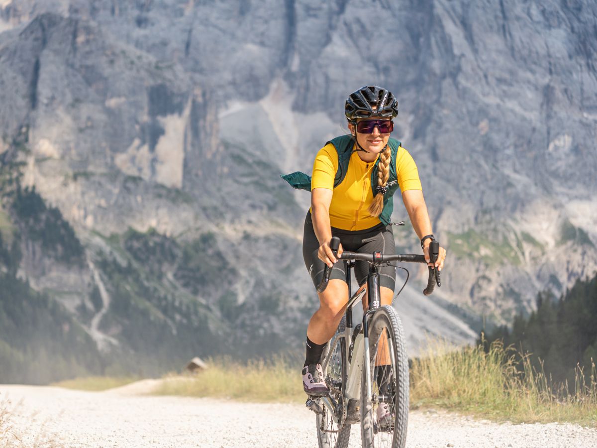 Cyclist riding 3T bike with mountain backdrop