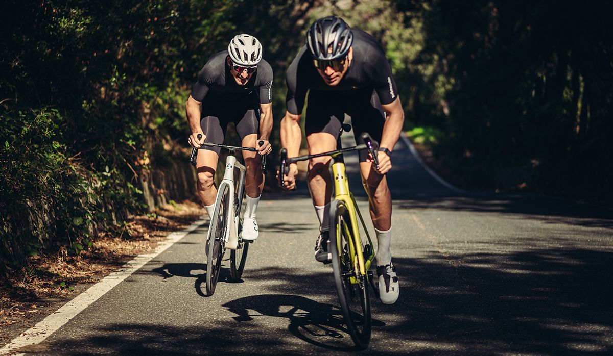 Cyclists riding up a hill